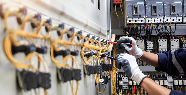 Professional Electrician technician working in Monroe Manor, NJ